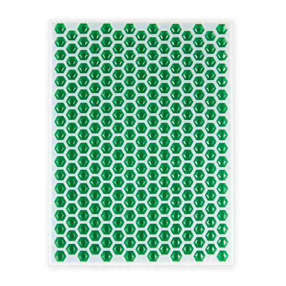 Top view of a 3mL hexagon gem gummy mold with 263 cavities filled with emerald green gummies on a white background